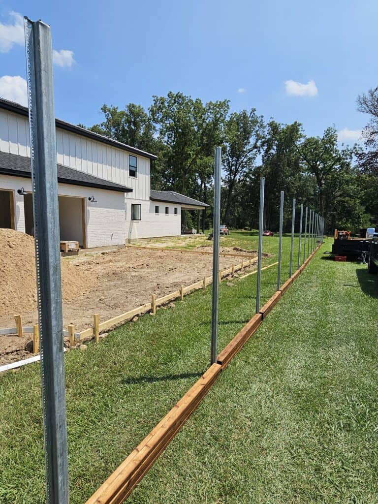 Postmaster steel posts installed by Lafayette Fence and Gate in Lafayette Louisiana